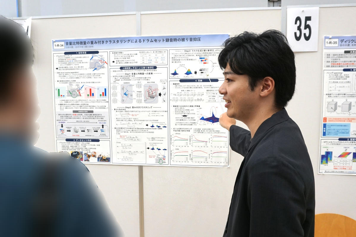発表中の鈴木慶君